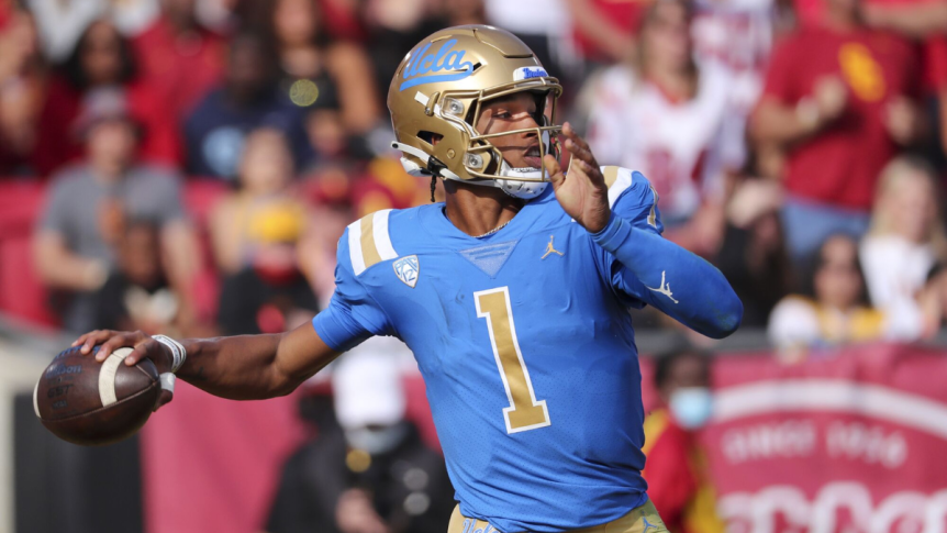 Headshot of Dorian Thompson-Robinson, UCLA quarterback and NFL draft prospect, wearing a football helmet preparing to throw