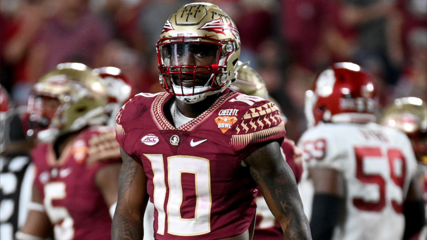 Jammie Robinson, a football player in his Florida State uniform, looking at the camera with a serious expression.
